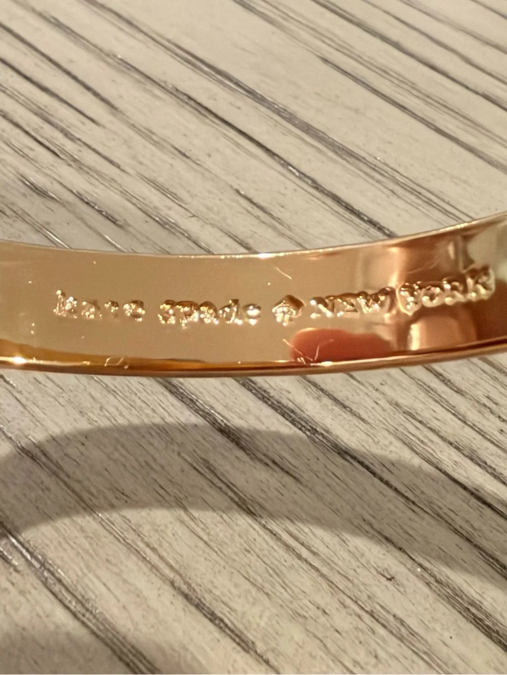 kate spade Gold-Tone Bangle with Black Enamel Spade Accents